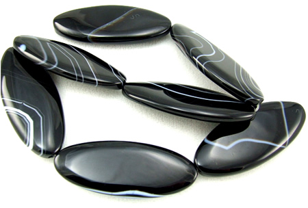 Design 5704: Black banded onyx coin, oval beads
