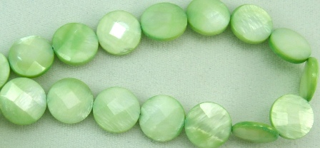 Design 5812: Green shell coin, faceted beads