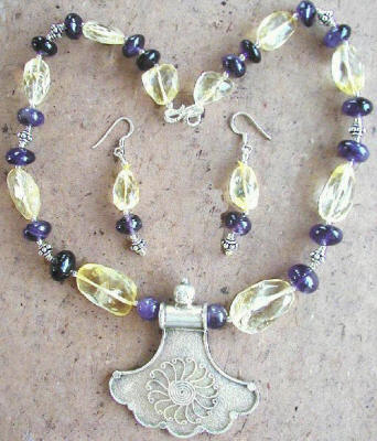 Design 1166: purple,yellow citrine medallion necklaces