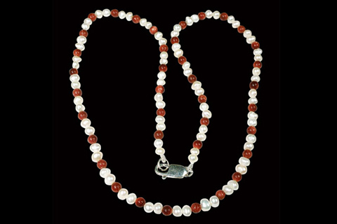 Design 236: white, brown pearl necklaces