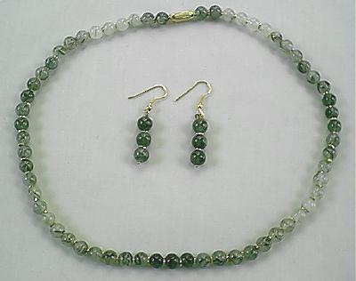 Design 314: green,white rotile necklaces