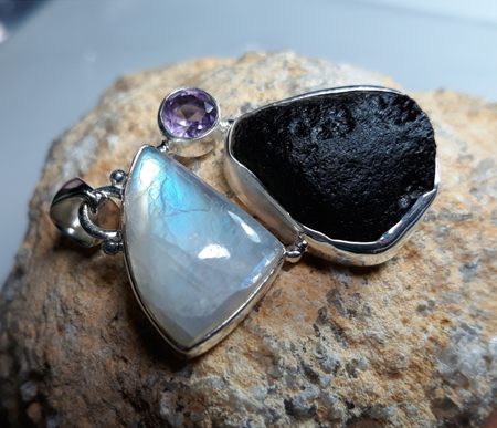Design 22160: black,purple,white moonstone pendants