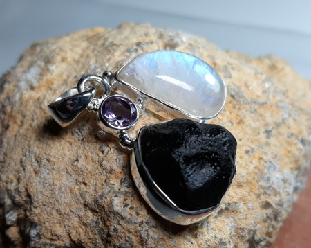 Design 22162: black,purple,white moonstone pendants